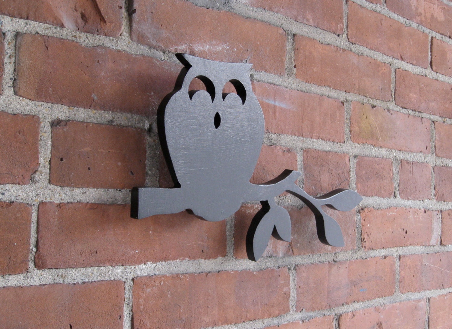 Owl on a branch wood cutout.