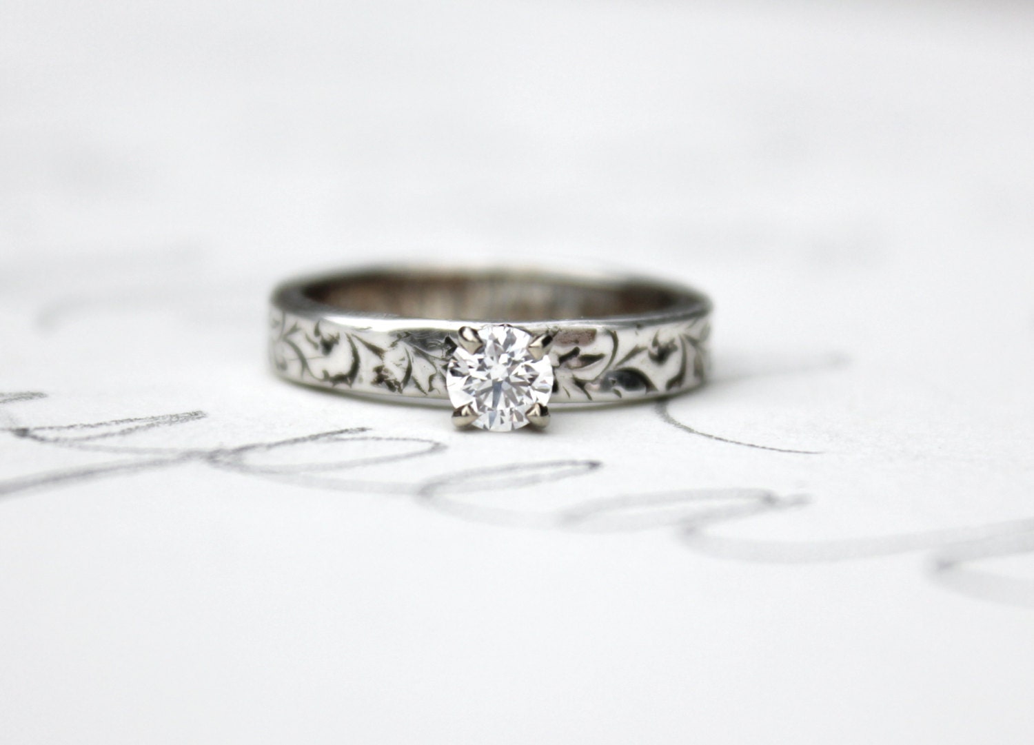 custom ethical diamond engagement ring . recycled fine silver band . 10k white gold prong setting . created in your size