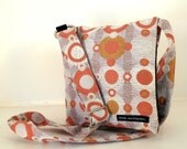 Hip Bag in Orange and gray Retro fabric. Adjustable strap. Cross Body Bag. Washable. Black ballistic nylon lining. Made in San Francisco.