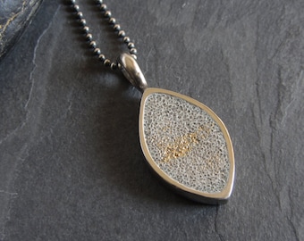 Cast bronze and concrete pendant necklace on sterling silver chain