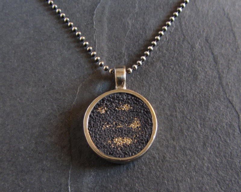 Black and gold concrete pendant in white bronze on sterling silver chain