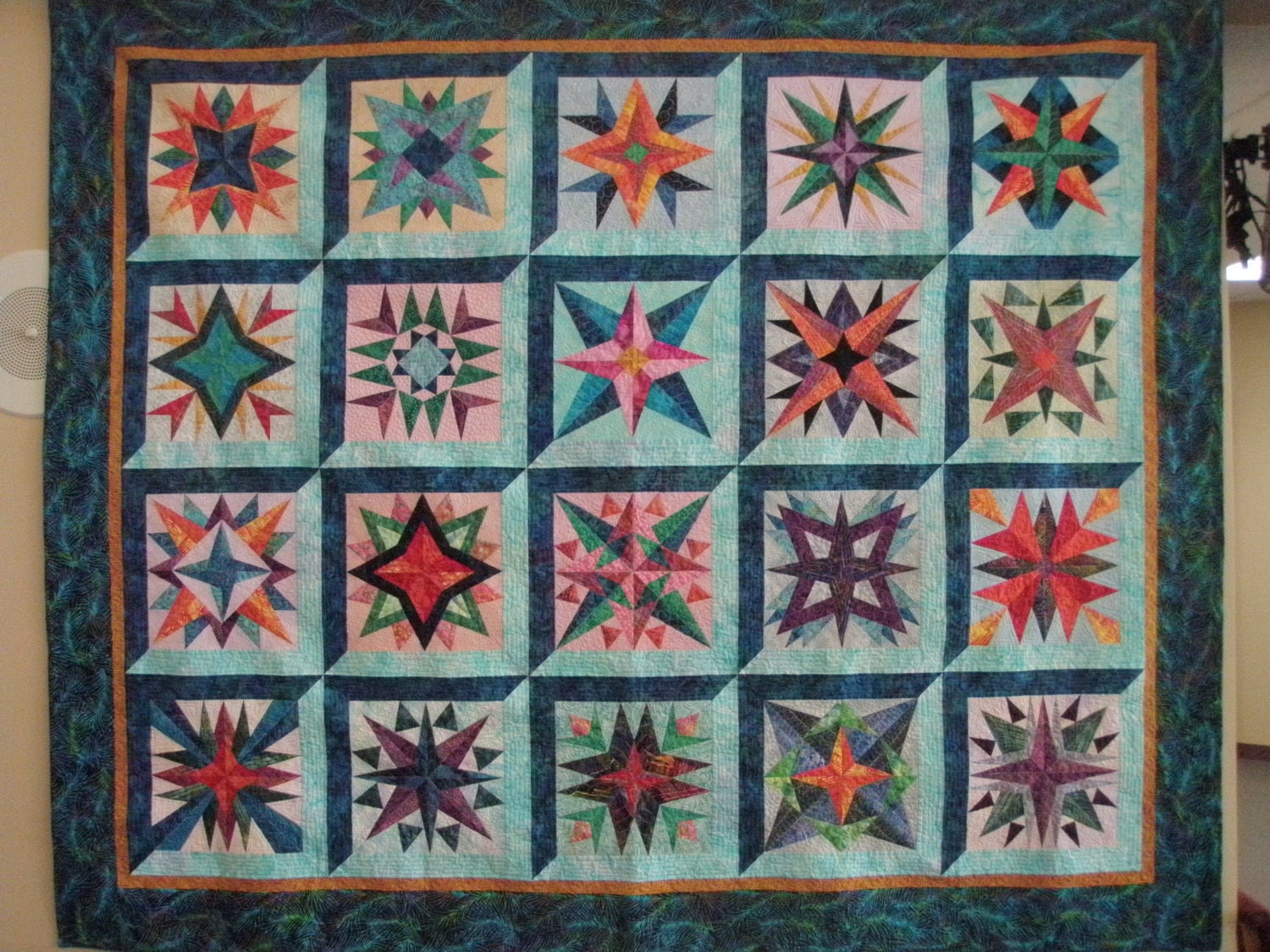Queen geometric batik patchwork quilt - Mariner's Stars