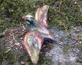 Folk art glitter bird in flight paper clay bird