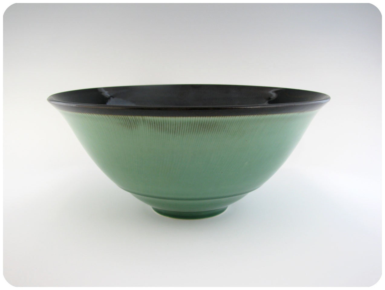 Bluegreen Porcelain Bowl With Chatter
