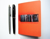 Writer's notebook orange jotter letterpress wood type letters typography photograph cover A6 blank plain paper journal Typescale stationery