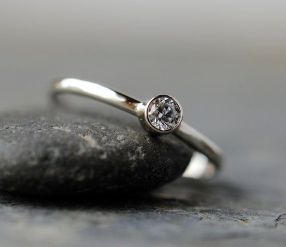 White Diamond Ring in 14k Palladium White Gold by
DalkullanJewelry White Diamond Ring in 14k Palladium White Gold by
DalkullanJewelry