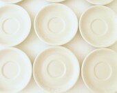 Set of Four White Ironstone Saucers