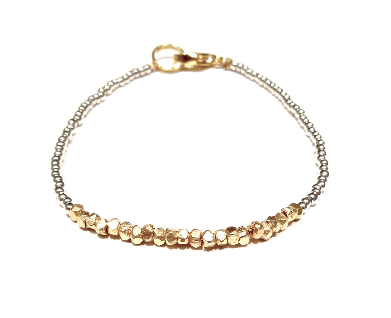 metalic heartlines in silver & gold // dainty bracelet with mini geometric nugget gold plated beads and shiny silver seed beads