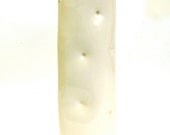 tall hand built wrapped and dimpled porcelain vessel   ...   creamy white