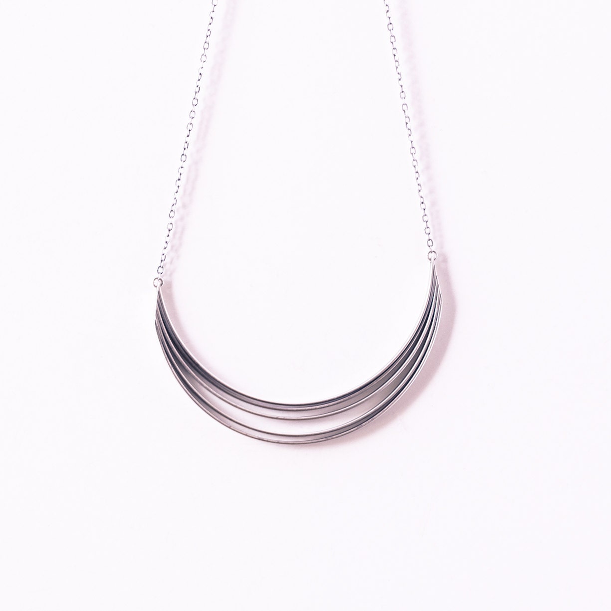 Silver arc necklace, streamlined union of five rectangular sterling silver wires formed into a sculptural half moon shape - "Fleet Necklace"
