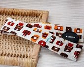 Camera Strap Cover (Padding and Lens Cap Pocket )- Say Cheese
