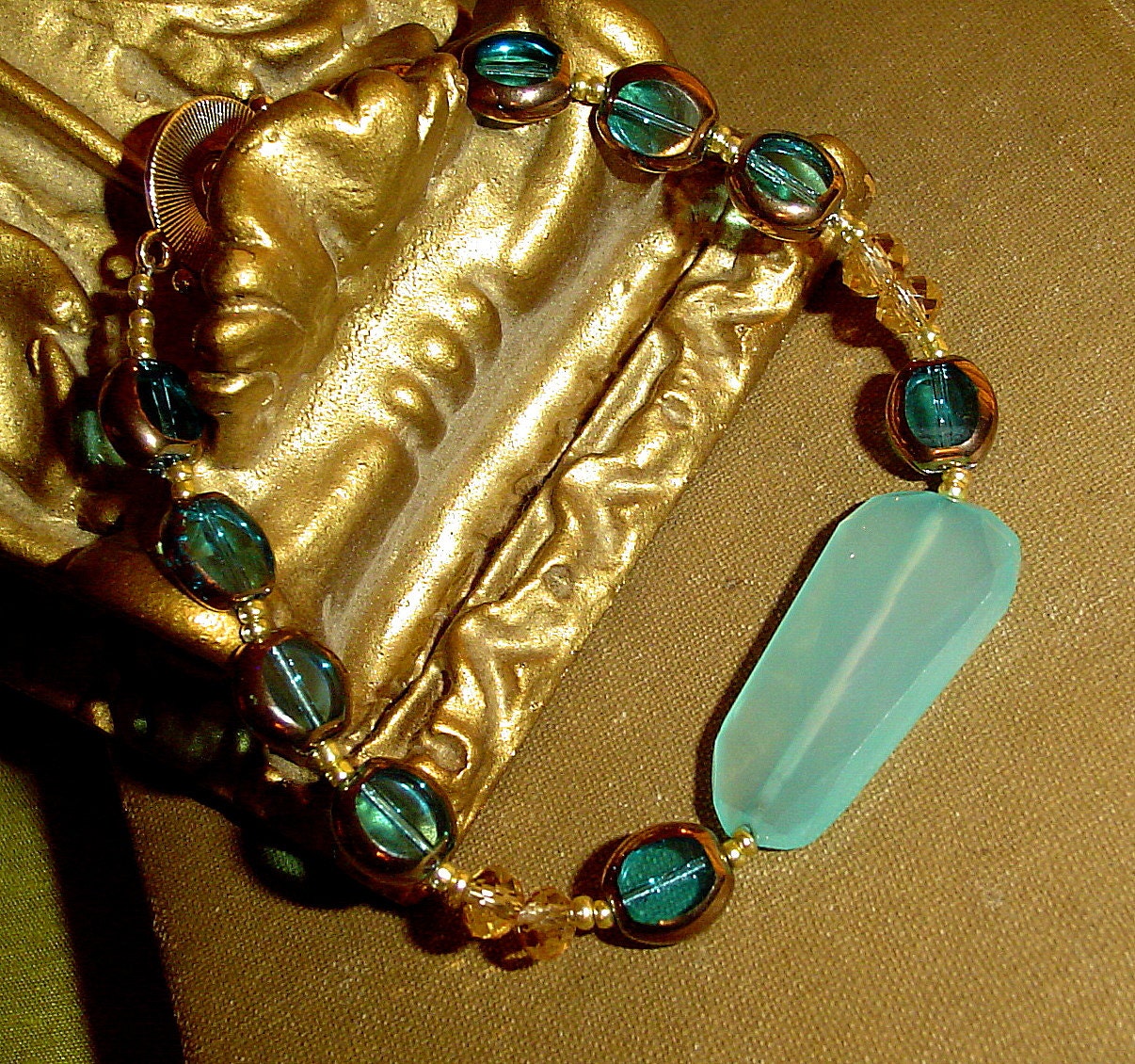 Sea opal bracelet in turquoise and gold handmade by MAB Jewelry