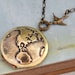 TRAVEL THE WORLD vintage brass locket necklace with world map globe