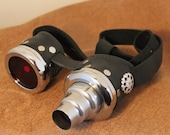 Steampunk goggles black and silver with scope looking attachment and red lenses
