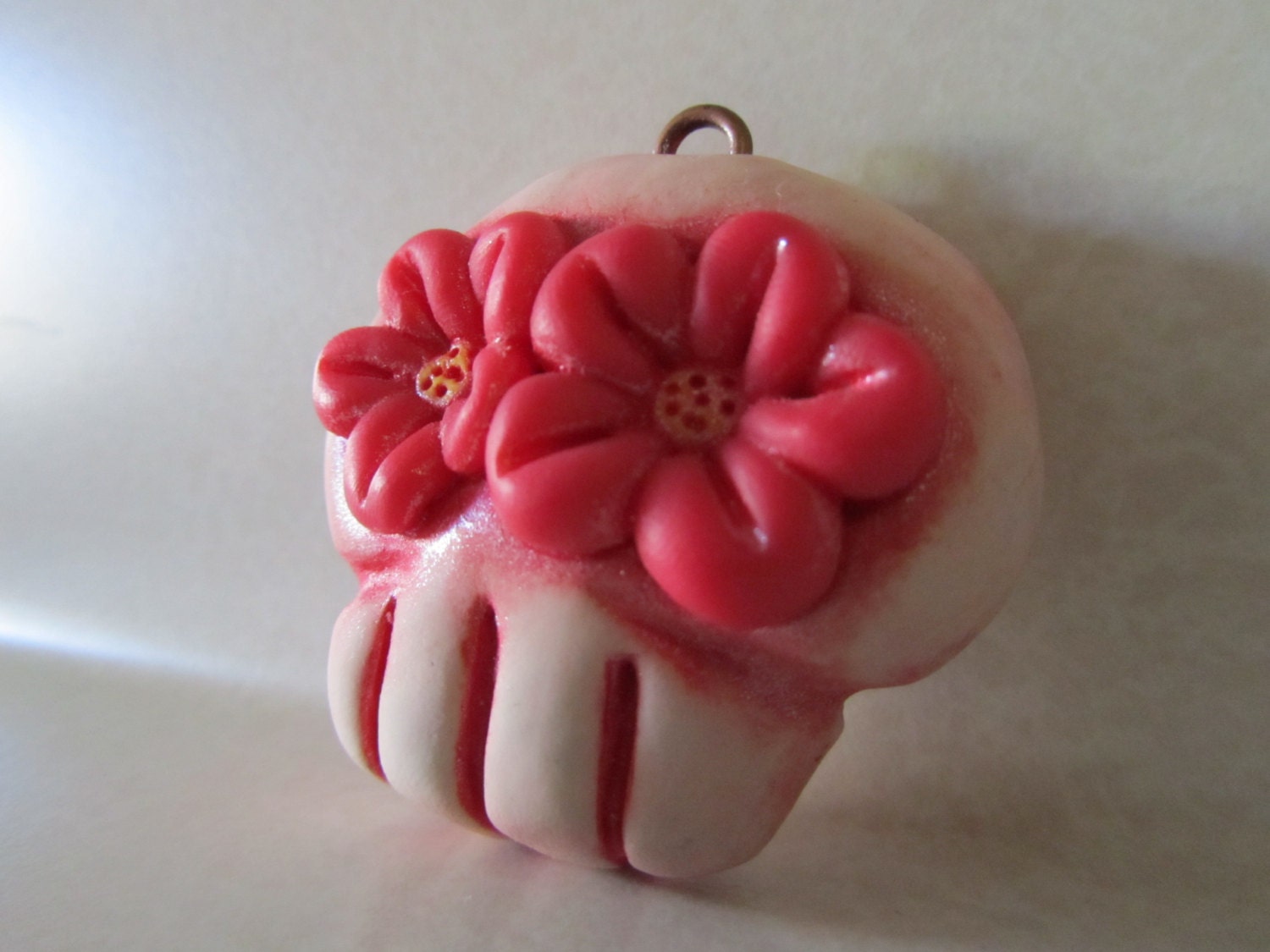 Skull ornament with red flowers