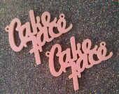 2 x Laser cut acrylic Cake Face pendants