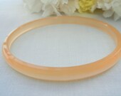 Moonglow Lucite Bangle Bracelet, Skinny Orange Peach