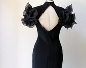 vintage 80's black keyhole body con party dress with organza ruffle sleeves.