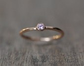 14 Karat Rose Gold Ring Set with 2mm Pink Sapphire