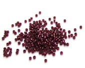 Toho Raspberry (with Silver Lined Square Hole) Round 8/0 Seed Bead
