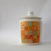 Cookie Jar. Vintage Spring Kitchen. Avon Patchwork. Patch. Retro. Mod. 70s. Orange. Green. Yellow. Flowers. Rhapsody Attic.