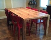 Modern solid reclaimed wood table. We make tables in any size. 72" l x 34" w x 30"  tall