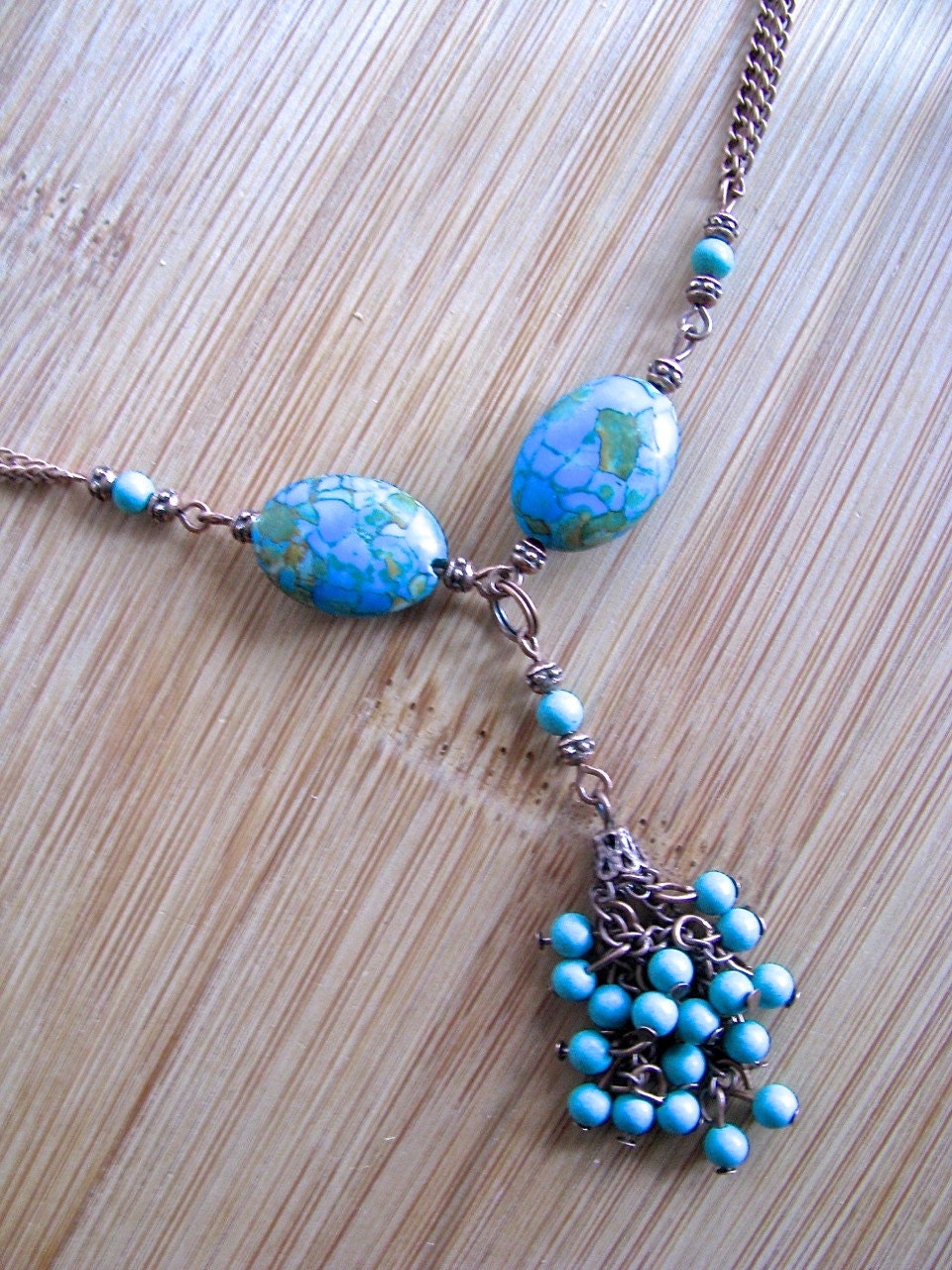 Mosaic Turquoise, Turquoise Dyed Howlite and Segmented Asymmetrical Copper Chain Necklace.