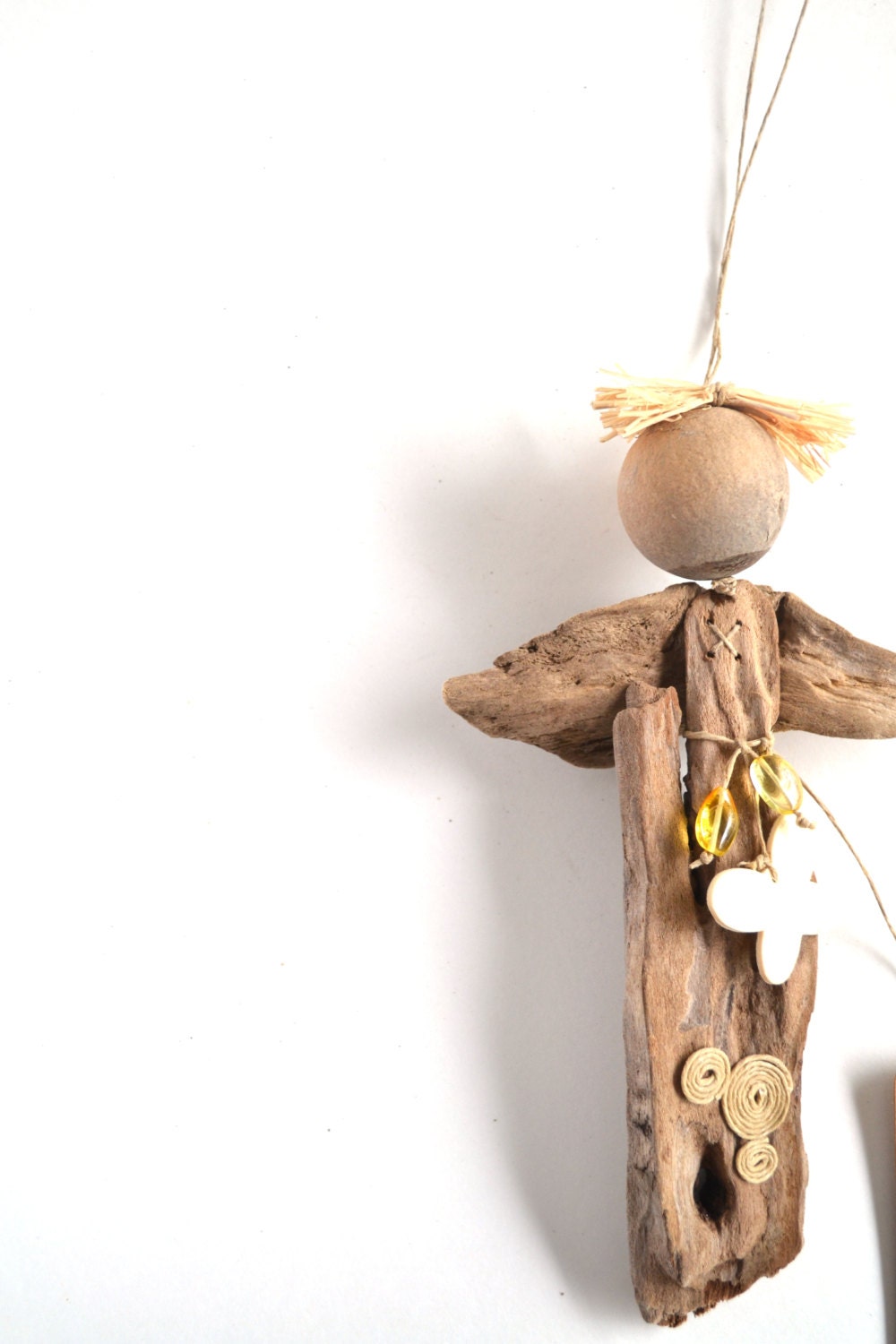 Driftwood angel decorated with real Baltic Sea amber