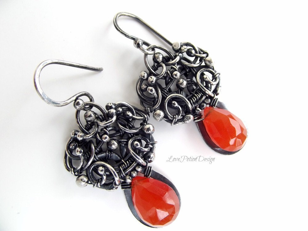 Wire Wrapped Sterling Silver Dangle Earrings With 14 mm Carnelian Drops.