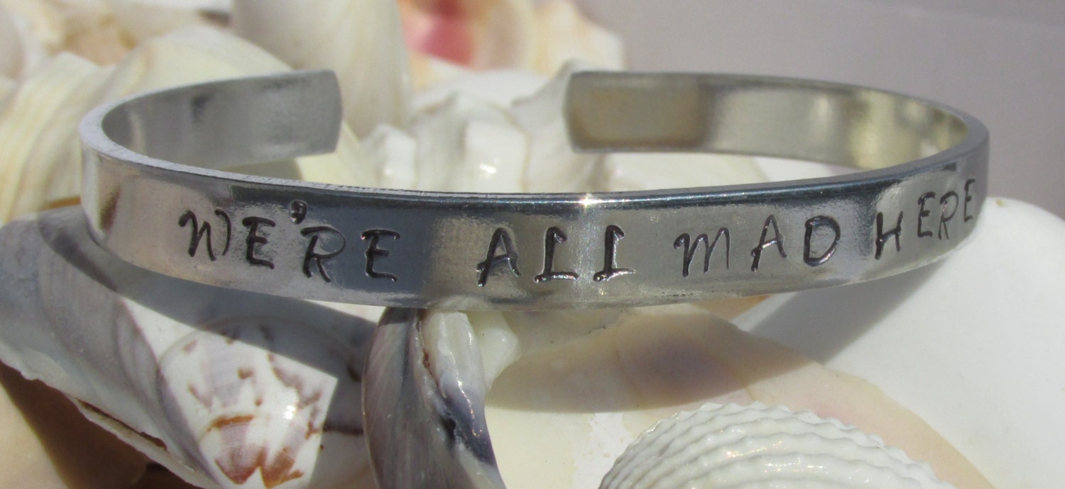 We're All Mad Here Hand Stamped Silver Toned Bracelet Inspired by Alice in Wonderland Stock Number 514D