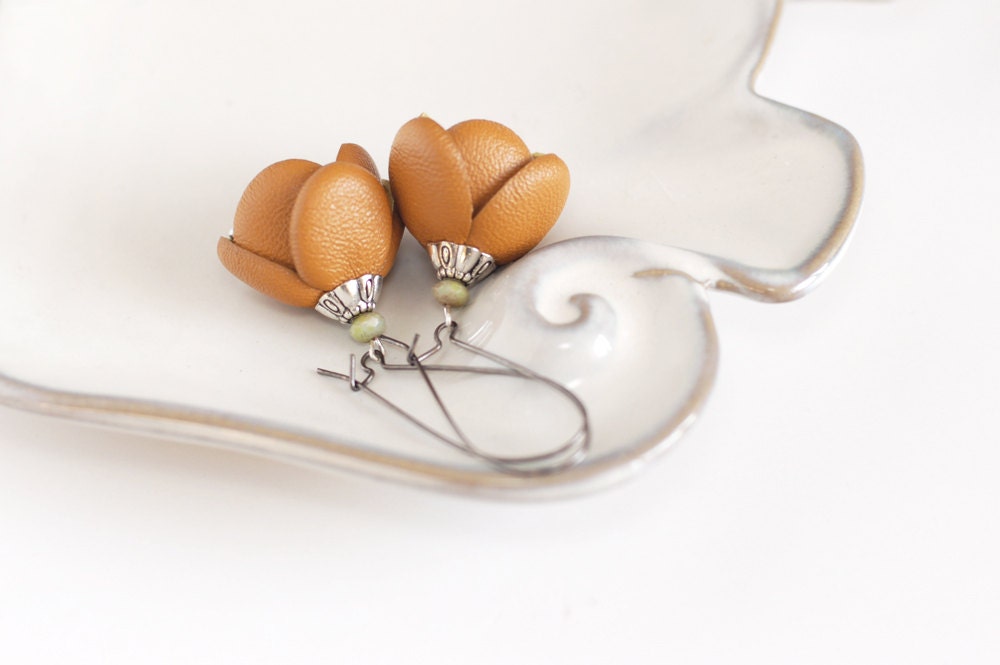 Modern style leather earrings in mustard yellow