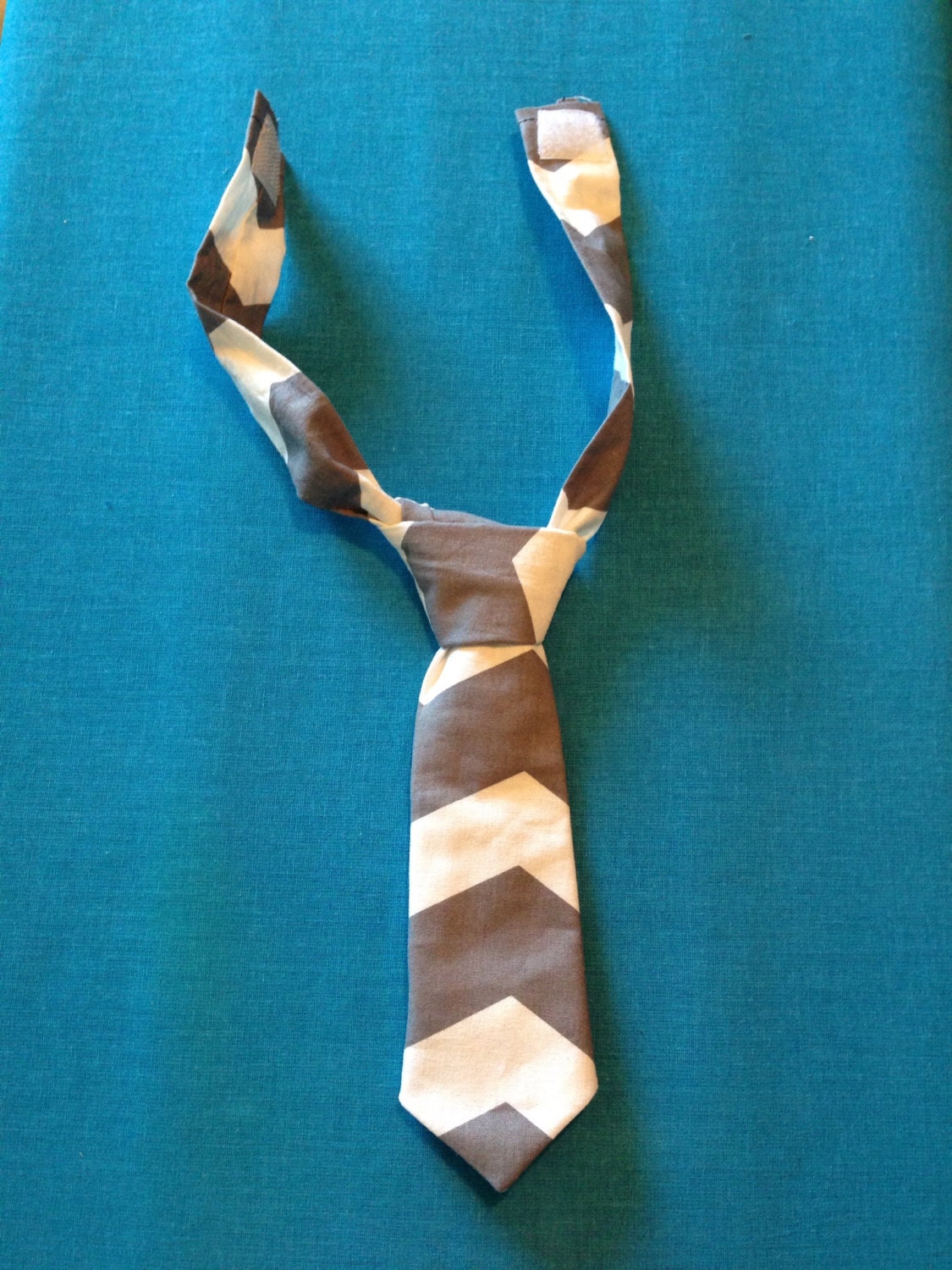 grey and white chevron tie. little boy. velcro tie. neck tie. toddler. tie. chevron print.