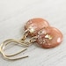 coral earrings with gold glitter and gold leaf on gold earwires - resin drop earrings