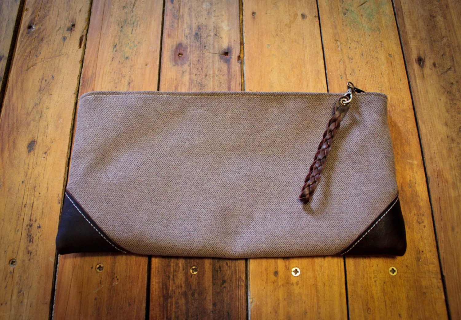 NZFINCH grey fabric clutch with leather detail, zip close, fully lined