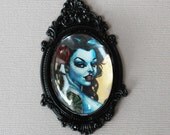 A gorgeous black haired tattooed vampire