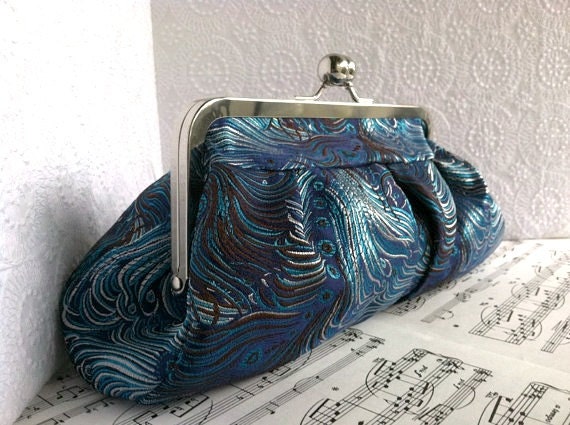 Blue Peacock Clutch Purse. Clutch bag in frame