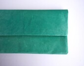 Suede clutch purse in pastel mint green