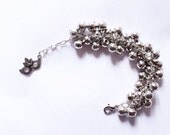 Jangi (round disco ball charm with mardi grass charm, party bracelet in silver, beads cluster bracelet)