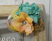 the SUMER Burlap and Fabric Rosette Headband or Hair Clip