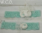 SomeThing Blue /To Have and To Hold/ Bridal Garter Set White Dupioni Silk Rosettes on Aqua Blue Stretch Lace