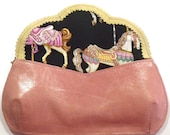 Gorgeous pink leather clutch with golden birds