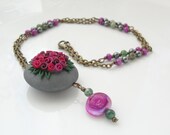 Deep pink rose lentil bead necklace design handmade from polymer clay