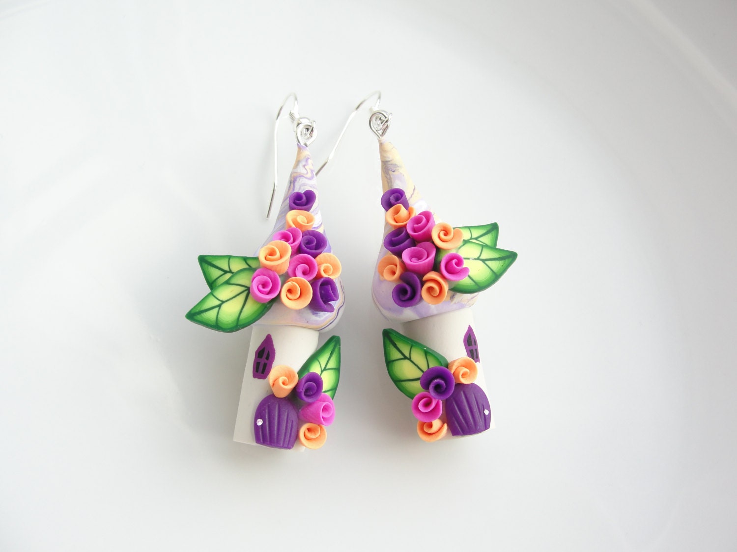 Miniature fairy house earrings in pink, purple and orange handmade from polymer clay
