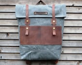 Waxed canvas backpack / rucksack with folded top and waxed leather shoulderstrap