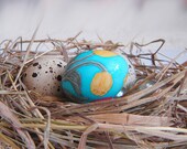 Tulips. Quail egg. Easter egg. Pysanka.