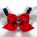 Garter single in white and navy blue satin with a red satin bow and a silver anchor charm - Simply Satin