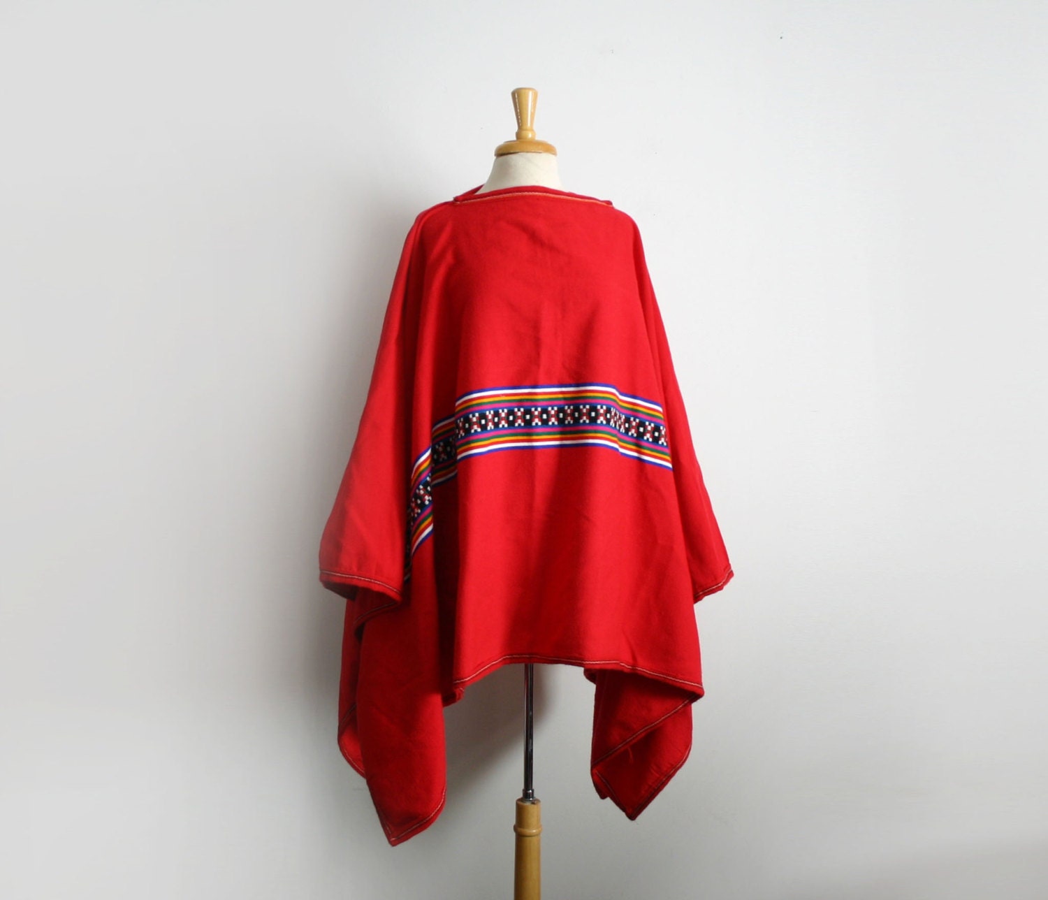vintage blanket poncho in red with a geometric pattern