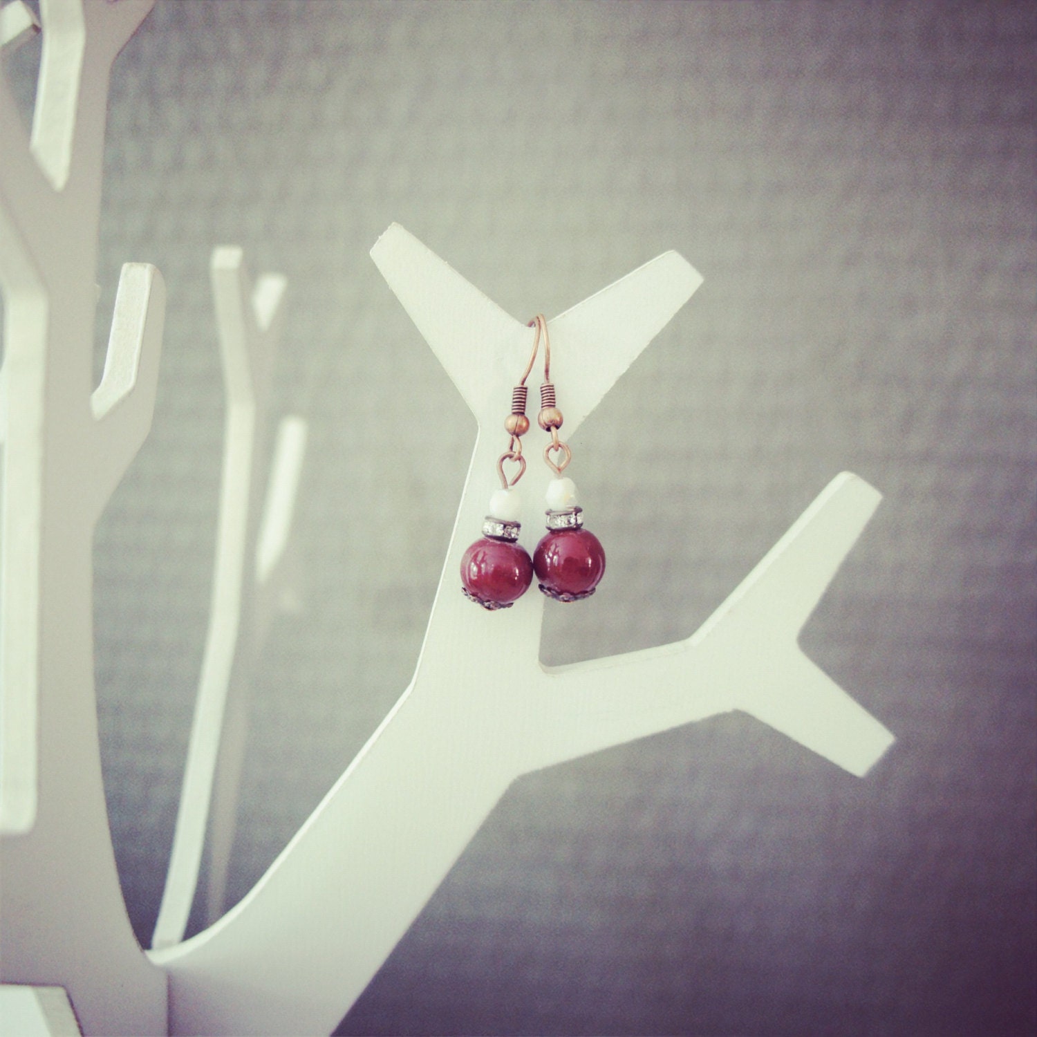 White and brown earrings