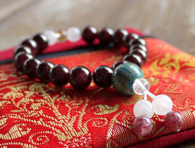 Garnet Gemstone Bracelet: Vitality & Abundance - TashiShok Garnet Gemstone Bracelet: Vitality & Abundance - TashiShok
