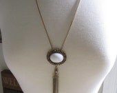 Necklace--White Bead Pendant with Gold Tassel Necklace. Handcrafted Jewelry by ConfettiStyleDesigns as featured in Country Living Magazine.